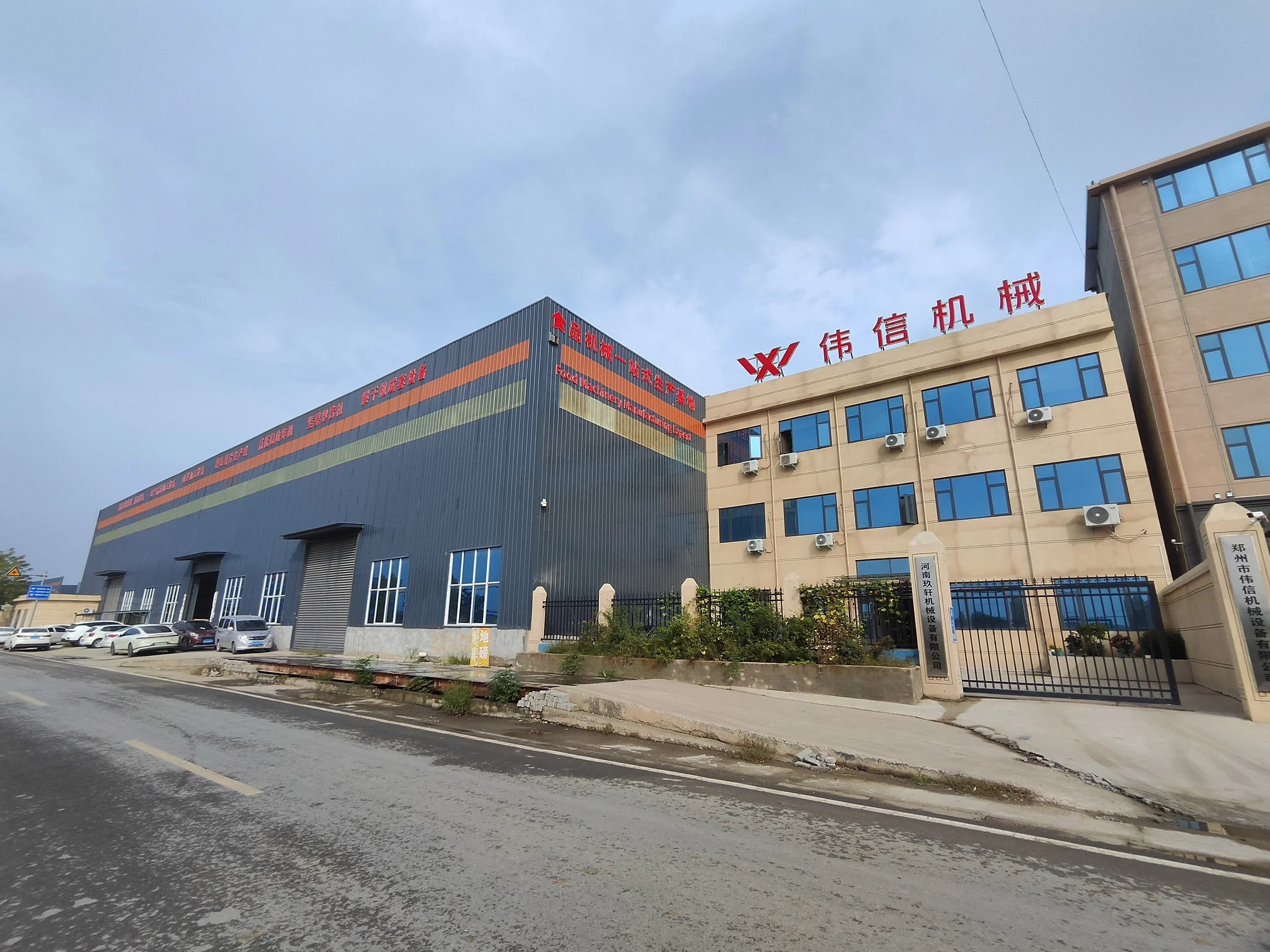 Joyshine factory workshop with laser cutting and welding stations